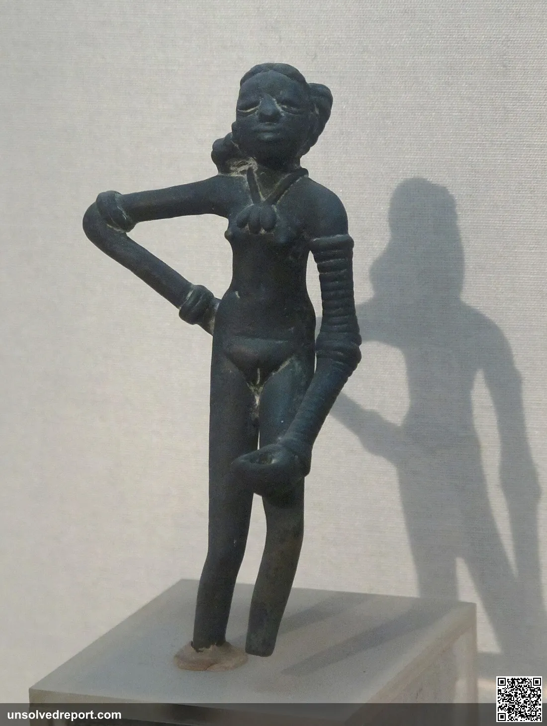 Copper "Dancing girl" statuette. 14 cm high. Found in 1926 in a house in Mohenjo-daro.