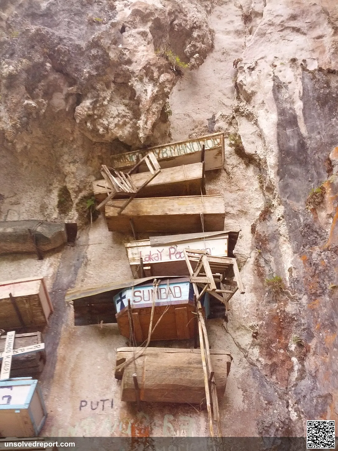 Coffins hanging by the cliff in Echo Valley, Sagada. Hanging coffins is an ancient burial custom among Igorot people of…