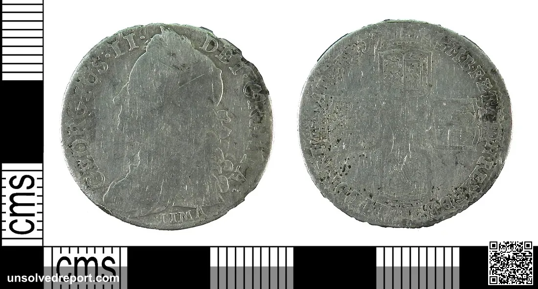 A silver LIMA shilling of George II, crowned cruciform shield reverse, mint of London, dated AD 1745. Spink, p.385, no.…